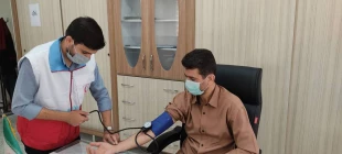 انجام تست فشار خون دانشجویان و کارکنان به مناسبت روز جهانی فشار خون بالا به همت سازمان جوانان جمعیت هلال احمر  4