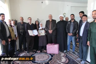 در آستانه سالروز شهادت حضرت فاطمه الزهرا(س)دیدار رئیس دانشگاه ملی مهارت مرکز ملایر با مادر شهید والا مقام رحمت اله احمدی 2