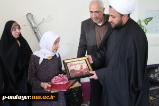 در آستانه سالروز شهادت حضرت فاطمه الزهرا(س)دیدار رئیس دانشگاه ملی مهارت مرکز ملایر با مادر شهید والا مقام رحمت اله احمدی 2